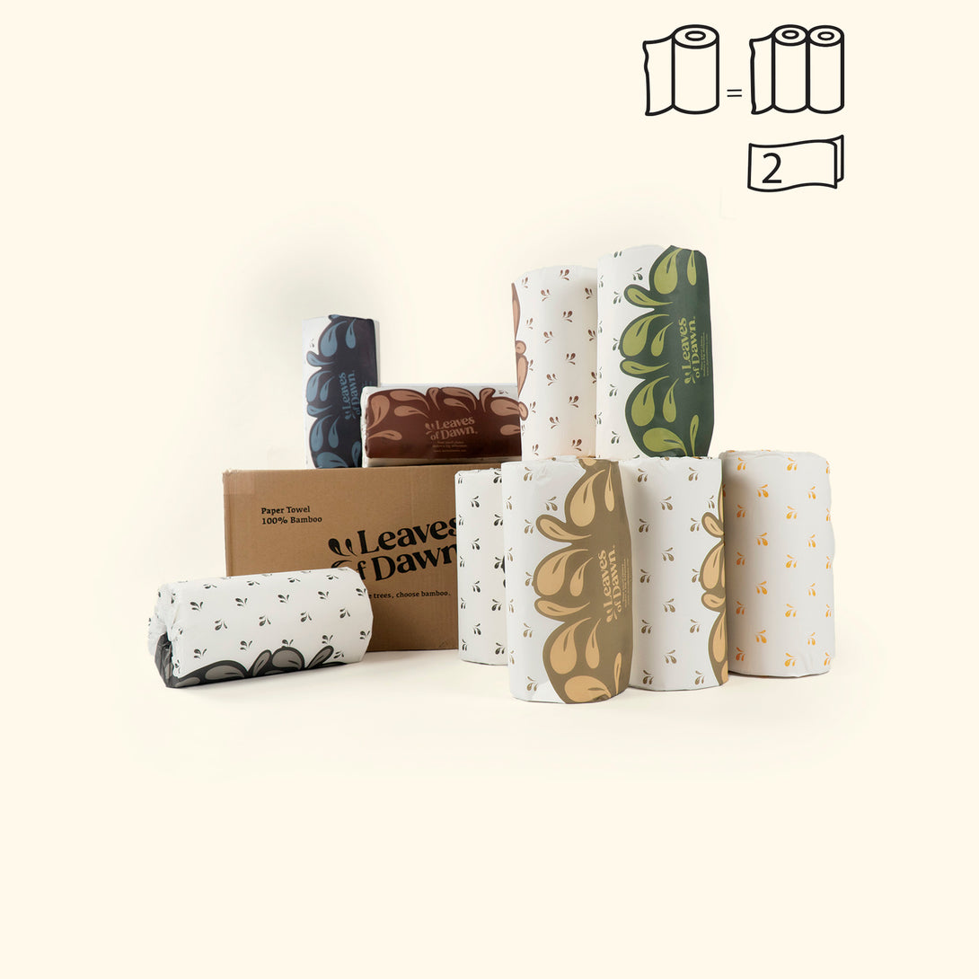 A 12-pack of Leaves of Dawn bamboo paper towels, an eco-friendly and ultra-absorbent solution for a clean home.
